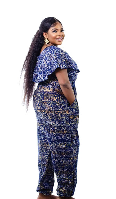 Full view of hand-dyed Adire cotton jumpsuit in vibrant colors