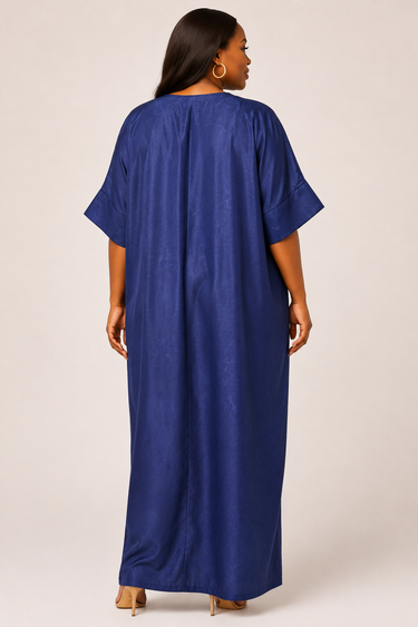 Full length view of an elegant navy blue plus size maxi dress in heavyweight silk weight woven fabric with subtle tone on tone jacquard texture and full button front closure from V neck to hem